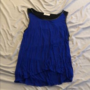 Blue and black tank top. Open back